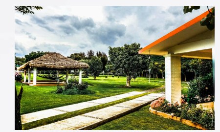 Casa Tonalli — palapa y jardines